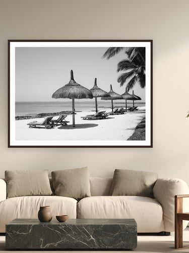 Island Time by Alex Wood from Pointe de Flacq, Mauritius - framed black frame fine art photography displayed in a modern living room setting