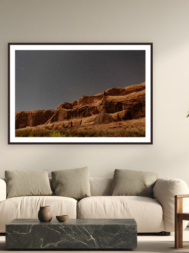 Moab In April by Bree Banning from Moab, Utah - framed black frame fine art photography displayed in a modern living room setting