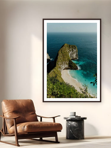 Nusa Penida by Bree Banning from Bali, Indonesia - framed black frame fine art photography displayed in a reading nook setting