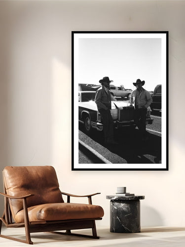 Black wood frame fine art print of Texan Outlaws by Brooklyn Phillips, West Texas, displayed on a reading nook wall — west Texas, 6 AM — the kind of place where cowboys pour whiskey in their morning coffee.