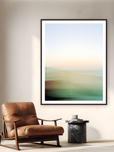 Abstract Pacific by Devon Cardamone from Malibu, California - framed black frame fine art photography displayed in a reading nook setting