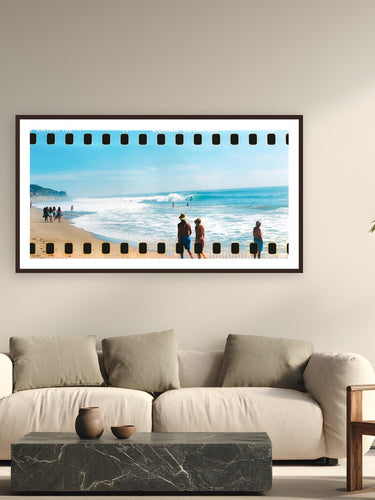 Film Tricks at Zuma by Devon Cardamone from Zuma Beach, CA - framed black frame fine art photography displayed in a modern living room setting