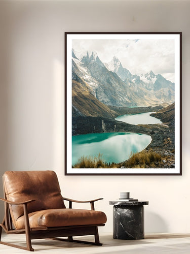 Los Lagos by Evan Ruderman from Cordillera Huayhuash, Peru - framed black frame fine art photography displayed in a reading nook setting