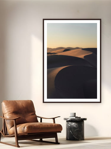Coastal Gold by Jeremy Bishop from Oceano, California - framed black frame fine art photography displayed in a reading nook setting