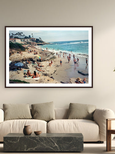 Summer Fun by Luis Ortega from La Jolla, California - framed black frame fine art photography displayed in a modern living room setting
