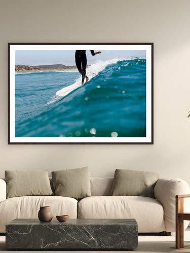 South of the Border by Ryan Valasek from Baja, Mexico - framed black frame fine art photography displayed in a modern living room setting