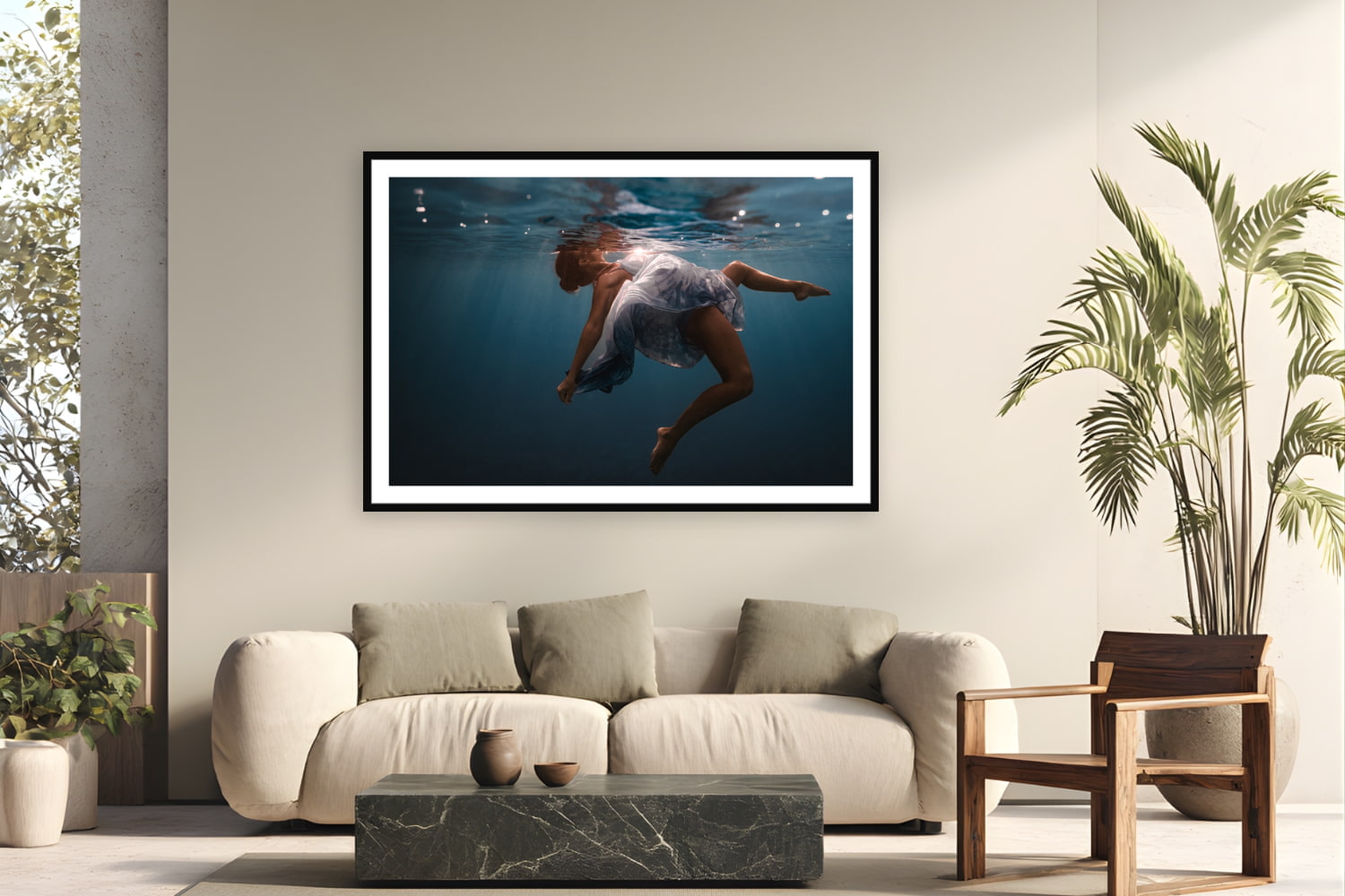 Black wood frame fine art print of Water Ballet by Sarah Swan, St. John, USVI, displayed on a modern living room wall — maddie is a ballet dancer who came to Sarah with the idea of shooting underwater — the Caribbean turned choreography into something else entirely.