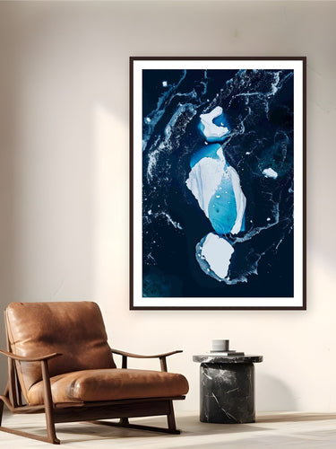 Anatomy of Ice by Tamara Susa from Antarctica - framed black frame fine art photography displayed in a reading nook setting