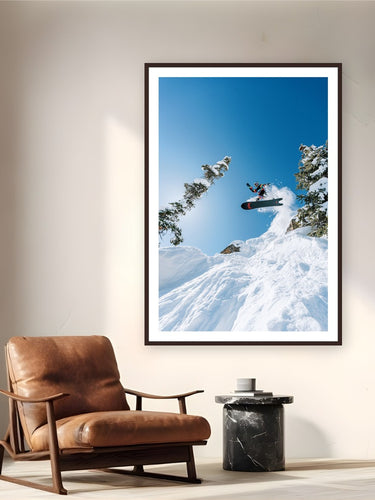 Cliff Jump by Tamara Šuša from Snowmass, Colorado - framed black frame fine art photography displayed in a reading nook setting