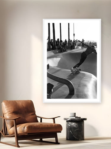 Sunset Slide by Adam Sherrett from Venice Beach, CA - white frame fine art photography displayed in a reading nook setting