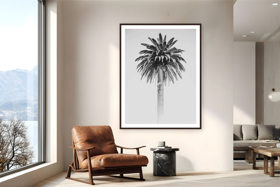 Retro Palm by Alex Wood from Santa Monica, California - framed black frame fine art photography displayed in a reading nook setting