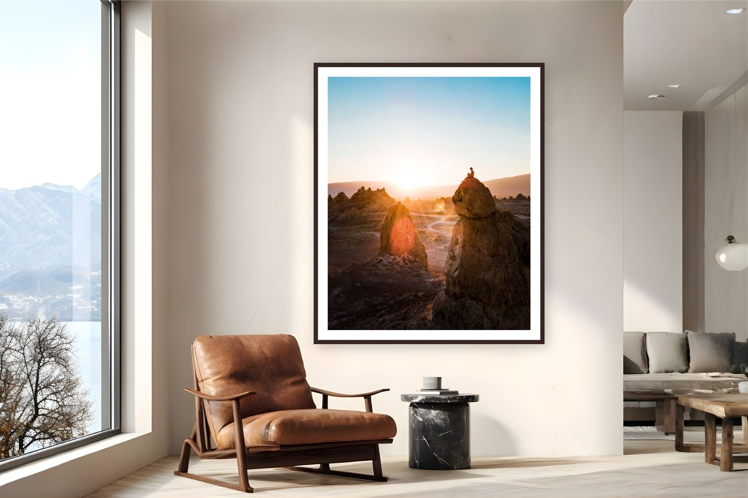 Trona Sunrise by Arthur Girard from Trona Pinnacles, California - framed black frame fine art photography displayed in a reading nook setting