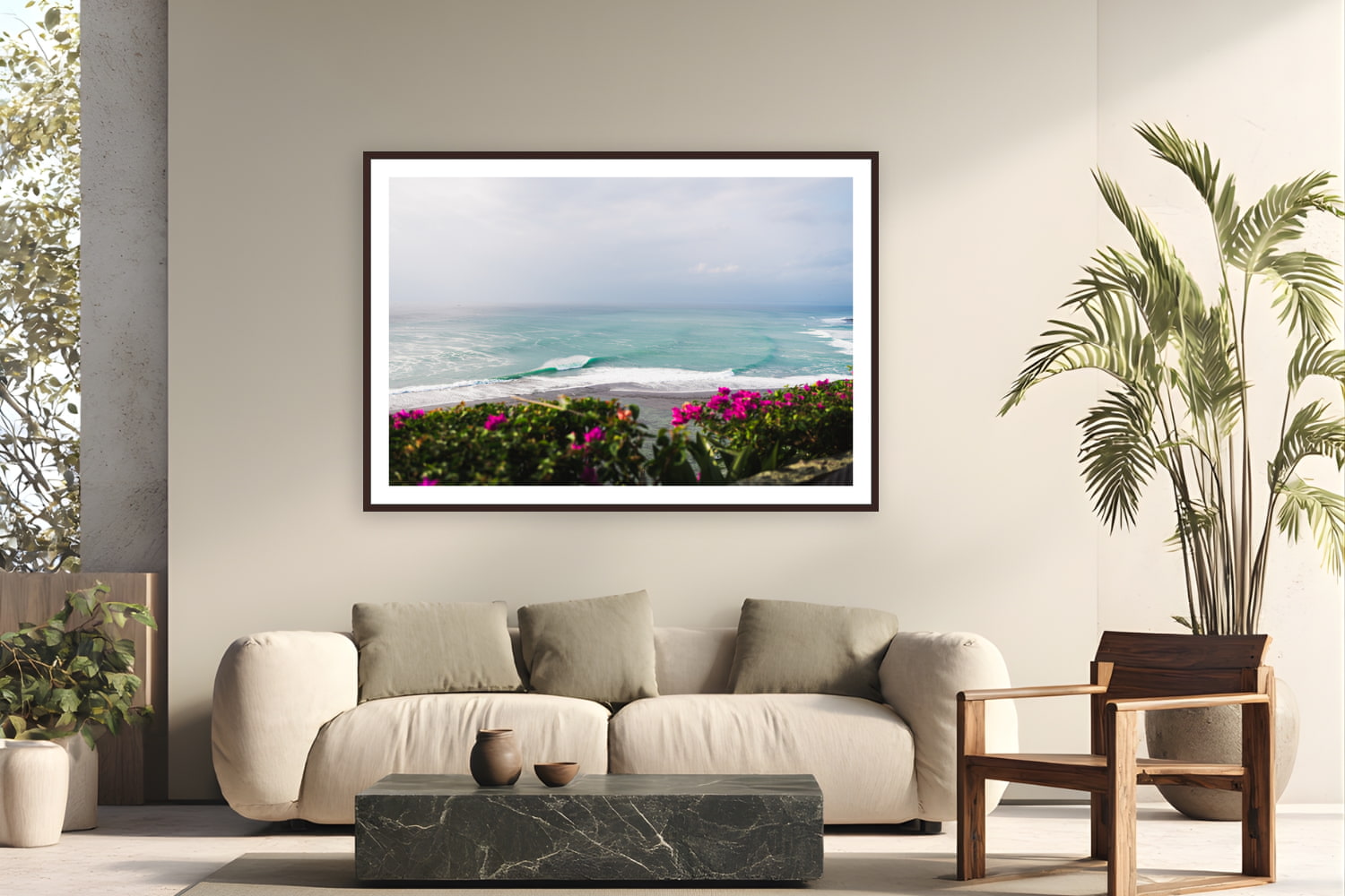 Black wood frame fine art print of From The Cliffs by Ben Gamlin, Bingin, Bali, displayed on a modern living room wall — bougainvillea, reef, and a dropping tide above Bali's Bingin Beach.