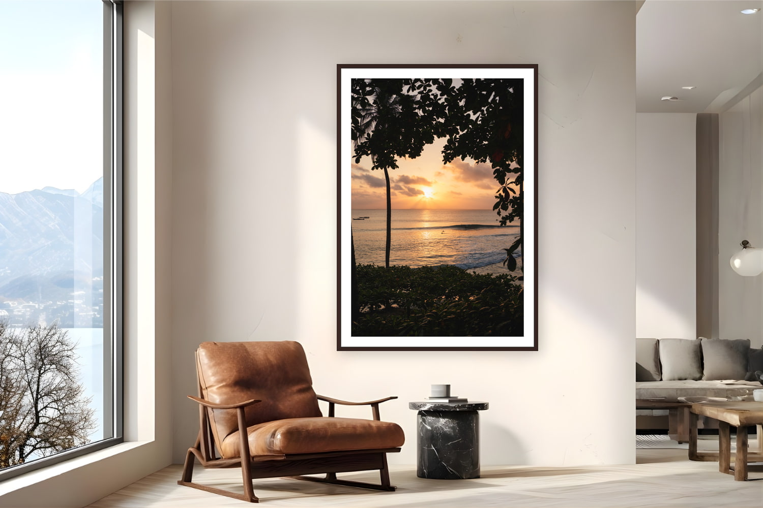 Black wood frame fine art print of Last Light by Ben Gamlin, Mentawai Islands, Sumatra, Indonesia, displayed on a reading nook wall — sunset in the Mentawais, palms in silhouette and a few surfers still in the water.