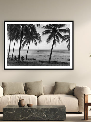 Black wood frame fine art print of Somewhere Else by Ben Gamlin, Middle Percy Island, Whitsundays, displayed on a modern living room wall — middle Percy Island sits 70 miles off the Queensland coast — reachable only by private boat.