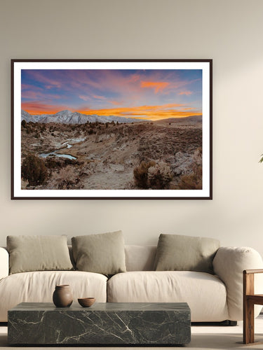Hot Springs Sunset II by Bree Banning from Mammoth, California - framed black frame fine art photography displayed in a modern living room setting