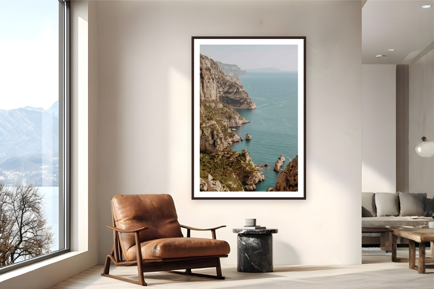 Les Calanques by Bree Banning from Marseille, France - framed black frame fine art photography displayed in a reading nook setting