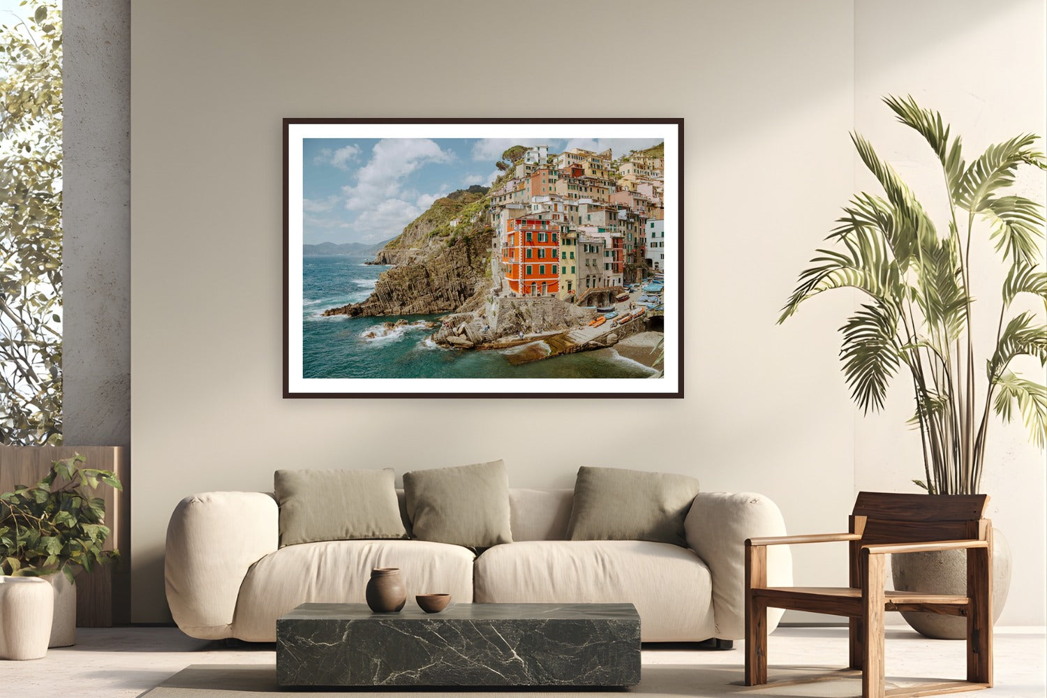 Riomaggiore by Bree Banning from Cinque Terre, Italy - framed black frame fine art photography displayed in a modern living room setting