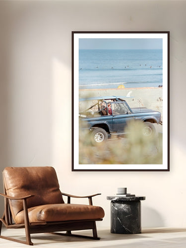 Malibu Bronco by Devon Cardamone from Malibu, California - framed black frame fine art photography displayed in a reading nook setting
