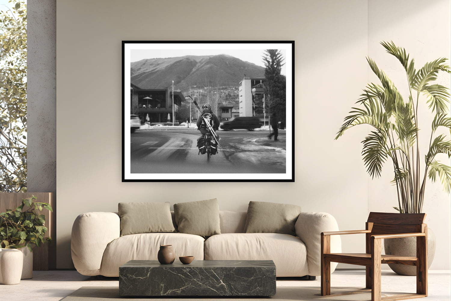 Black wood frame fine art print of Morning Commute by Devon Cardamone, Aspen, CO, displayed on a modern living room wall — downtown Aspen — where the mountain is close enough to bike to with your skis on your back.