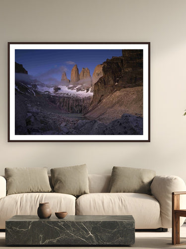 Patagonia Sunrise by Evan Ruderman from Torres Del Paine, Patagonia, Chile - framed black frame fine art photography displayed in a modern living room setting