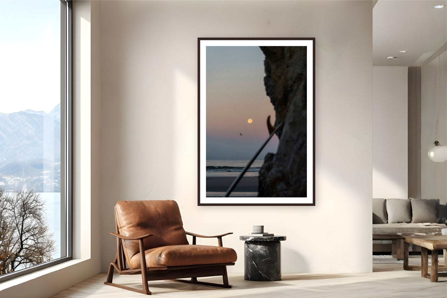 Red Moon by Jeremy Bishop from Pismo Beach, California - framed black frame fine art photography displayed in a reading nook setting