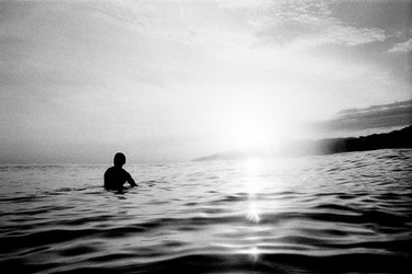 Lonely Surfer - fine art adventure photography print from Devon Cardamone - available at Middles Creative