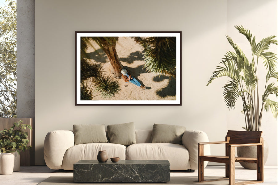 Cowboy Nap by Ryan Valasek from Joshua Tree, California - framed black frame fine art photography displayed in a modern living room setting