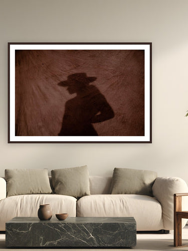Dune Raider by Ryan Valasek from Joshua Tree, California - framed black frame fine art photography displayed in a modern living room setting
