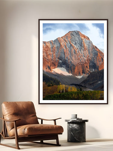 Above The Fall Line by Sam Ferguson from Snowmass, Colorado - framed black frame fine art photography displayed in a reading nook setting
