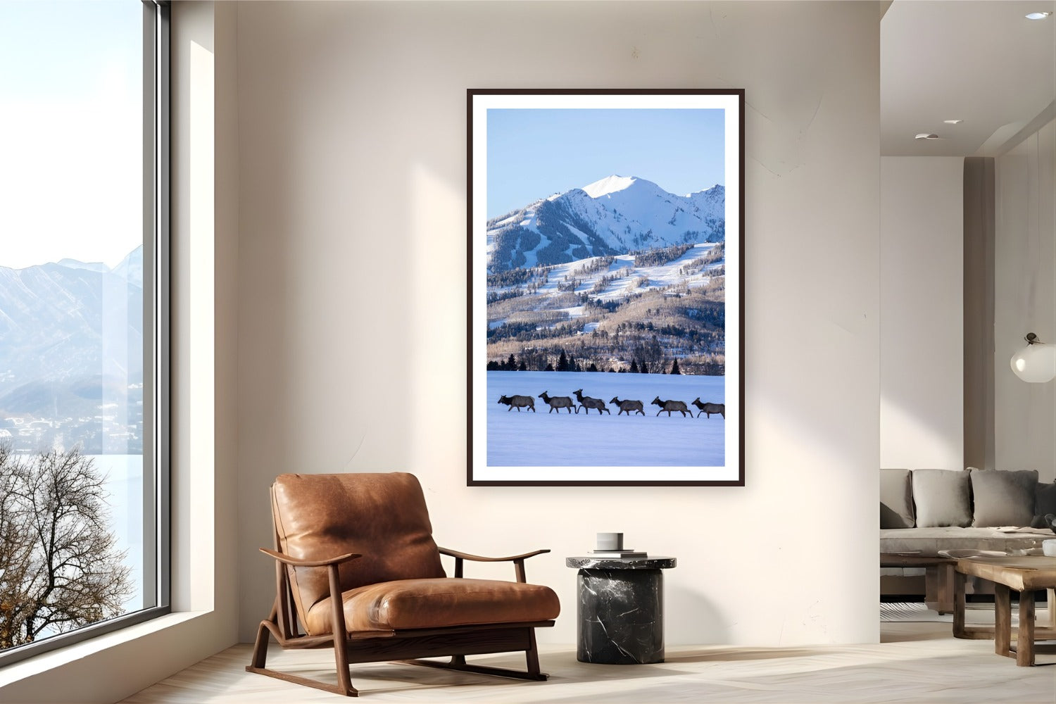 Elk Crossing by Sam Ferguson from Aspen Highlands, Colorado - framed black frame fine art photography displayed in a reading nook setting