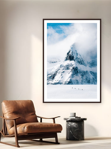 Into the White Cathedral by Tamara Susa from Antarctica - framed black frame fine art photography displayed in a reading nook setting
