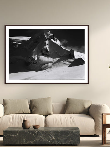 Skiing Chiriguano Bay by Tamara Susa from Antarctica - framed black frame fine art photography displayed in a modern living room setting