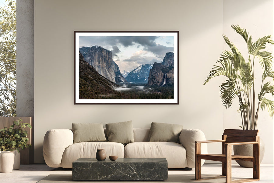 Yosemite's Timeless Gaze by Tom Ingram from Yosemite National Park, California - framed black frame fine art photography displayed in a modern living room setting